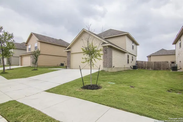 a house view with a garden space