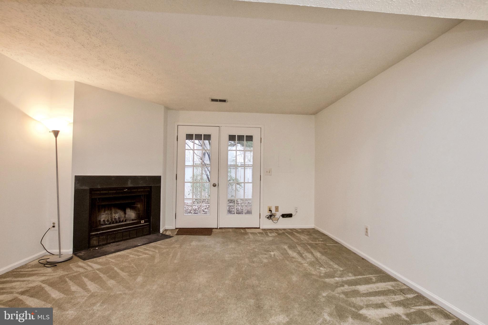 1915 Belmont Ridge Court Reston, VA 20191 - Photo 23 of 34 BASEMENT - DOOR TO PATIO AND BACK YARD
