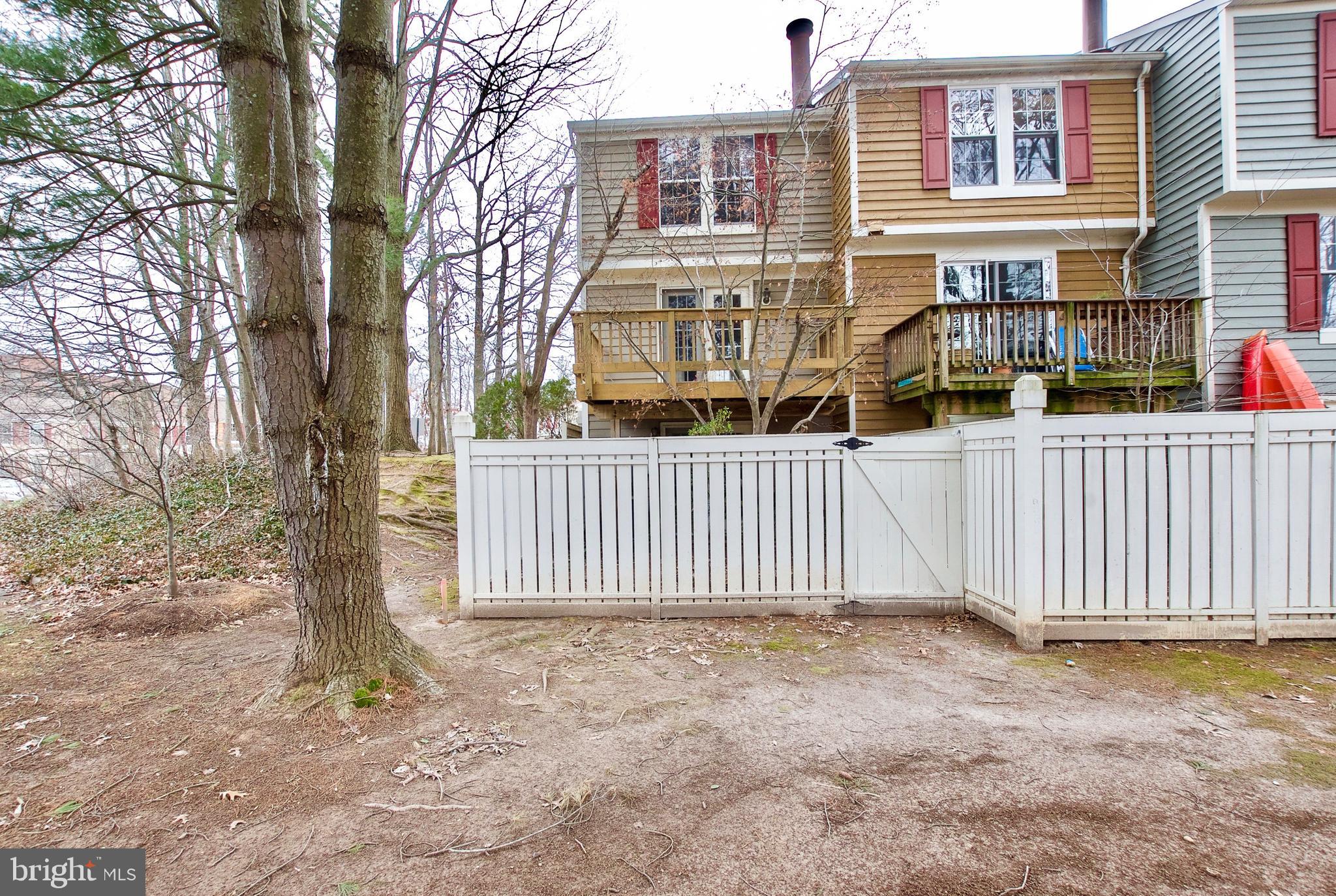 1915 Belmont Ridge Court Reston, VA 20191 - Photo 6 of 34 FENCED YARD WITH DECK