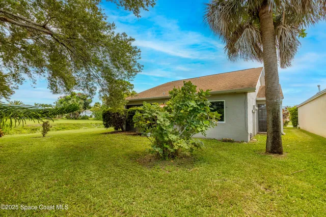 a view of swimming pool with a patio
