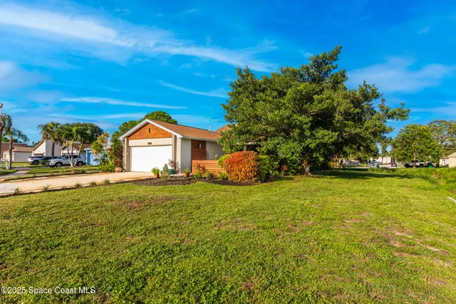 a view of swimming pool with lounge chair