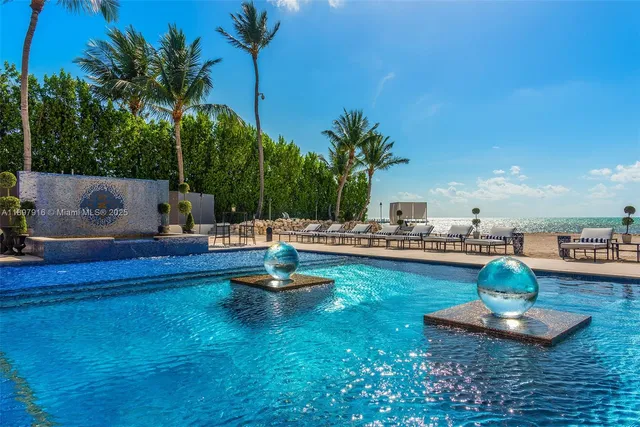 a view of a swimming pool with a patio