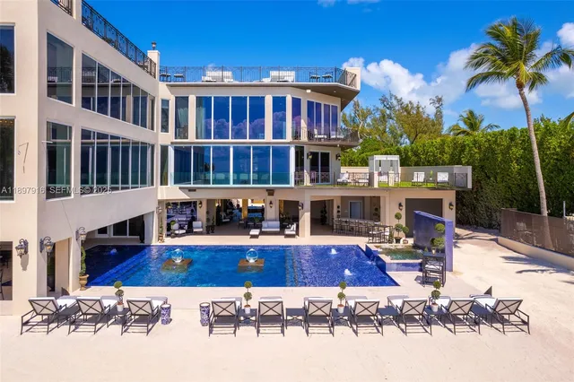 a view of pool with outdoor seating