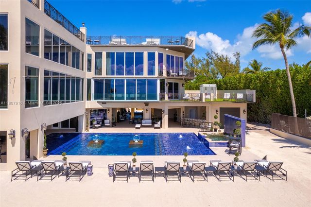 a view of pool with outdoor seating