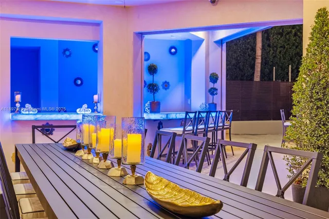 a view of swimming pool with seating area