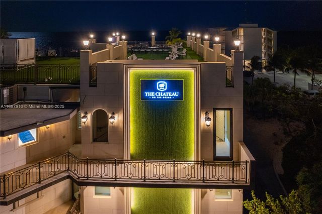a view of swimming pool with outdoor seating