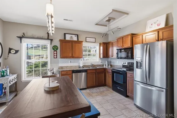 $249,900 | 50 Tom Watson Court, Unit 600A, Lake Ozark, MO 65049