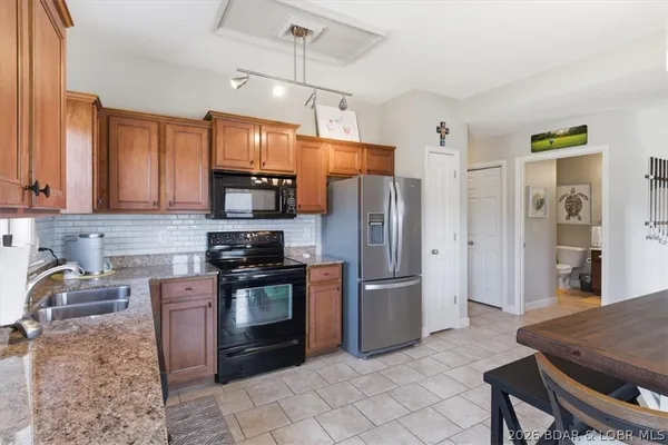 $249,900 | 50 Tom Watson Court, Unit 600A, Lake Ozark, MO 65049