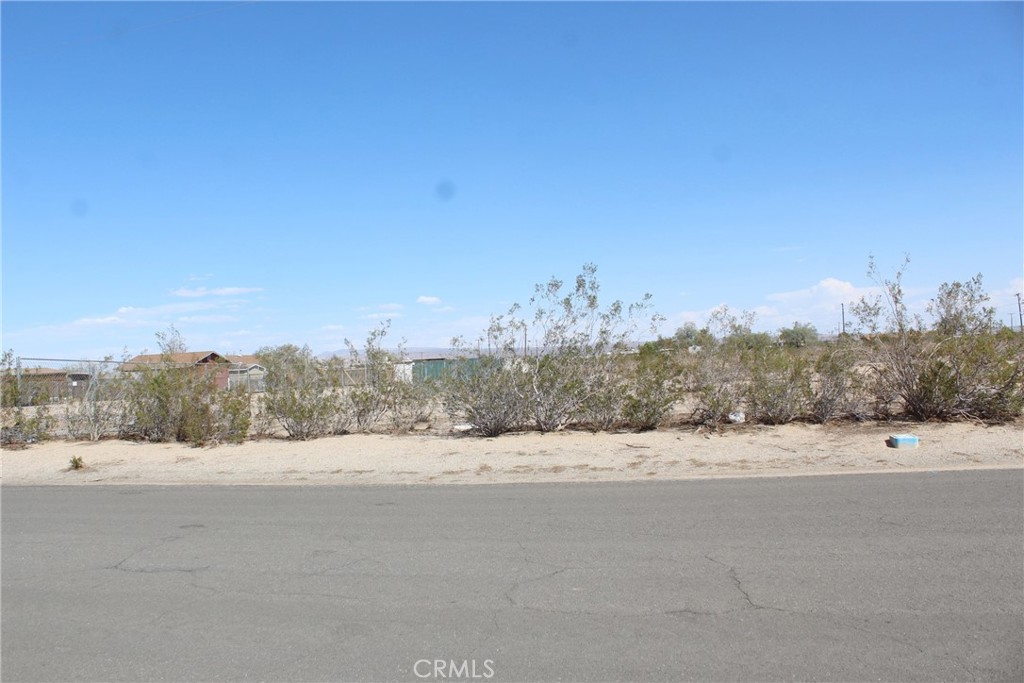 11 Olanche Street Mojave, CA 93501 - Photo 6 of 8 a view of a road with a building in the background