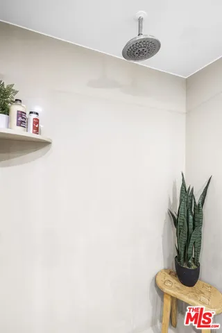 a vase with flowers sitting on a table