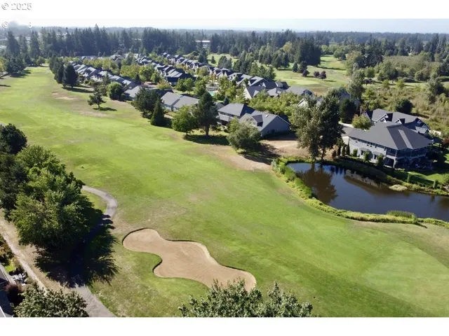 a view of a backyard of the house