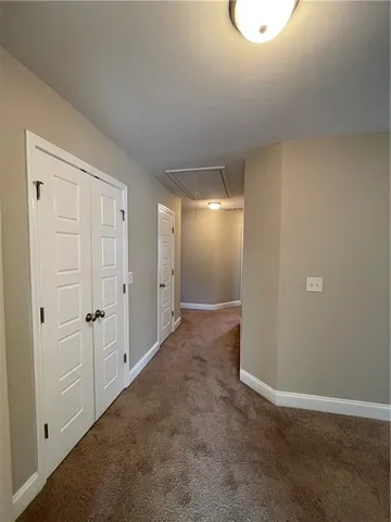 a view of a room with racks on the wall