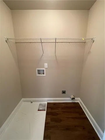 a bathroom with a toilet and a bathtub