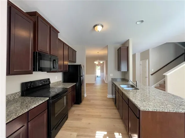 a lobby with furniture and window