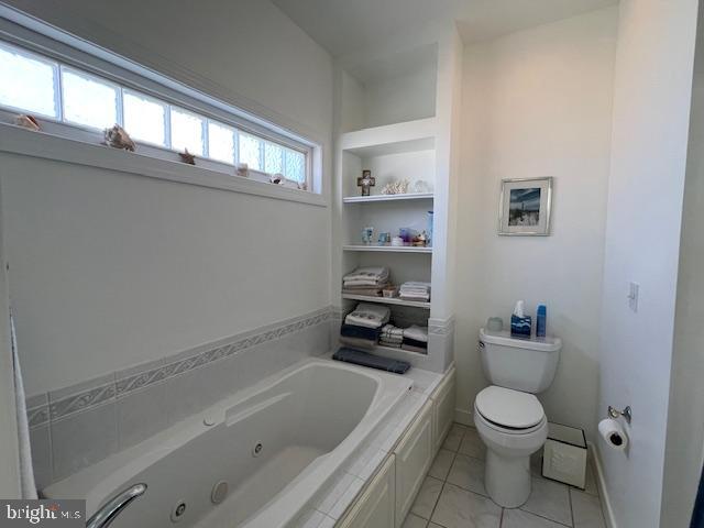 3 Bayberry Street, Unit 2 Georgetown, DE 19947 - Photo 16 of 21 a bathroom with a toilet sink and bathtub