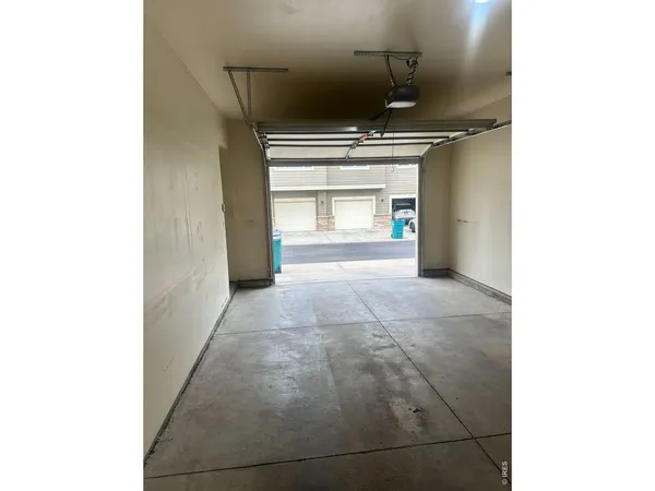 a view of hallway with granite countertop