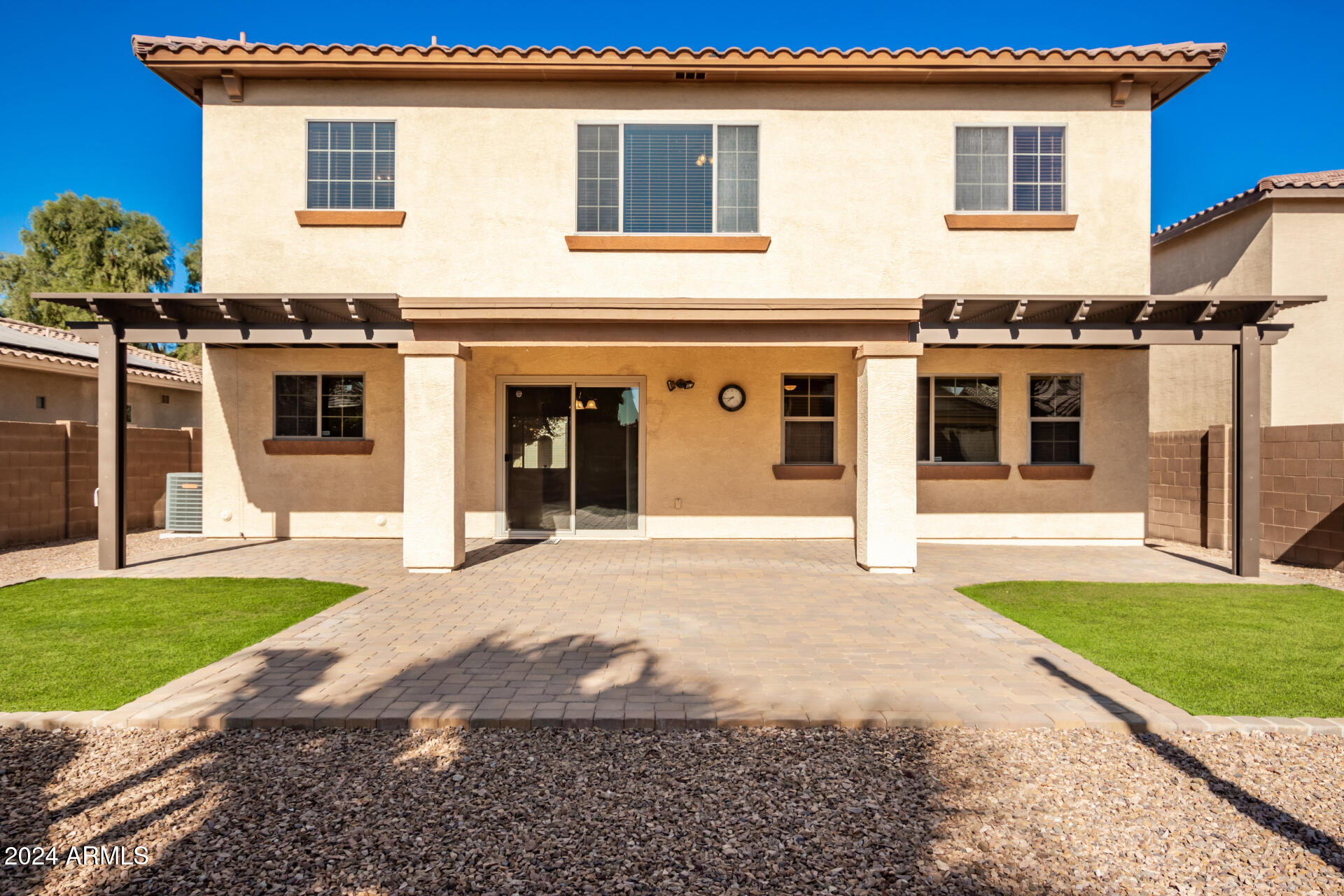 45335 West Rhea Road Maricopa, AZ 85139 - Photo 1 of 52 a front view of a house with a yard and garage