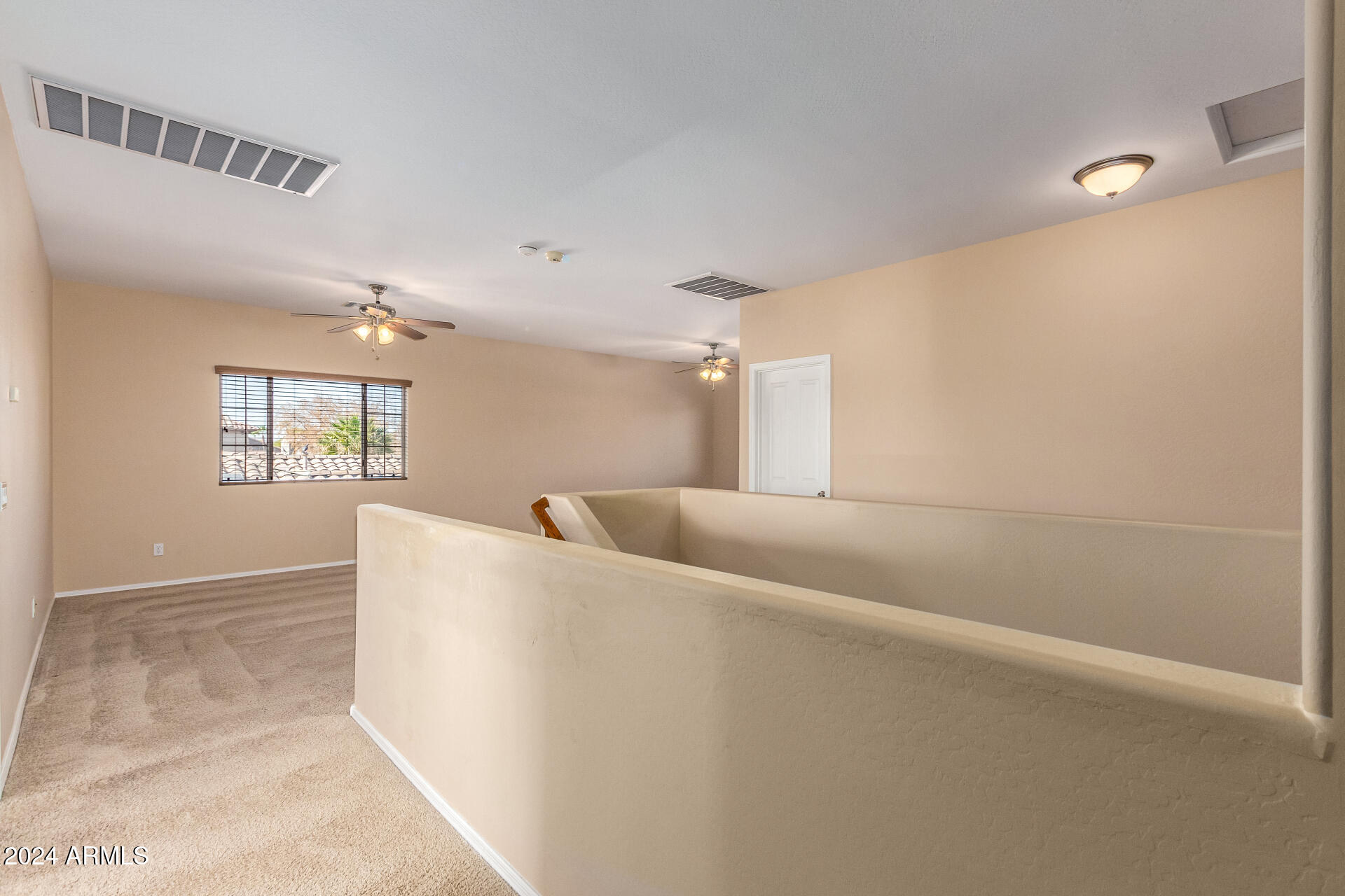 45335 West Rhea Road Maricopa, AZ 85139 - Photo 40 of 52 a view of livingroom with window