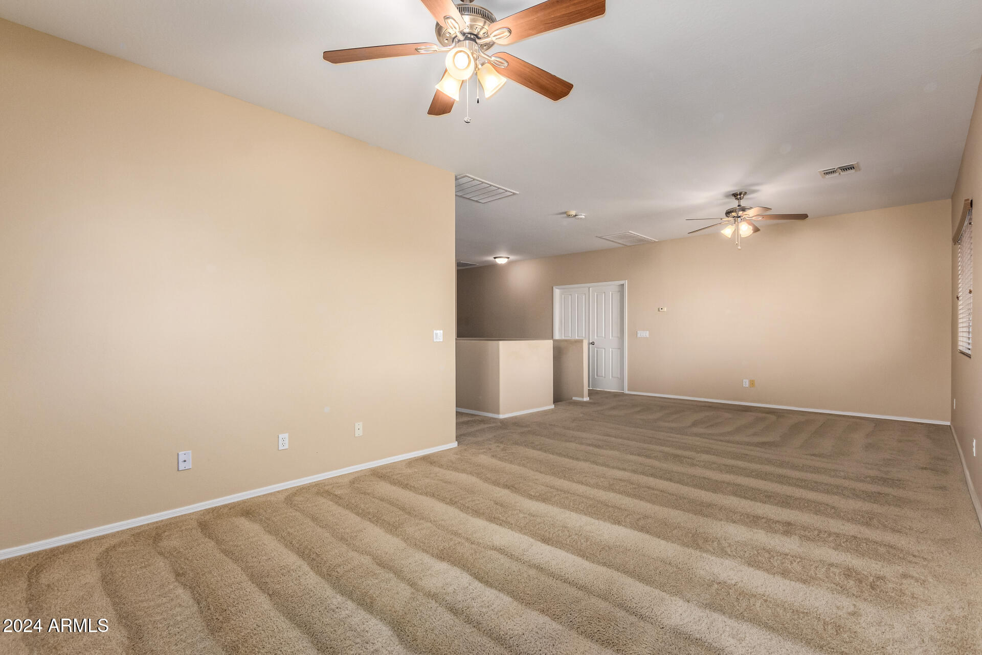 45335 West Rhea Road Maricopa, AZ 85139 - Photo 44 of 52 a view of an empty room