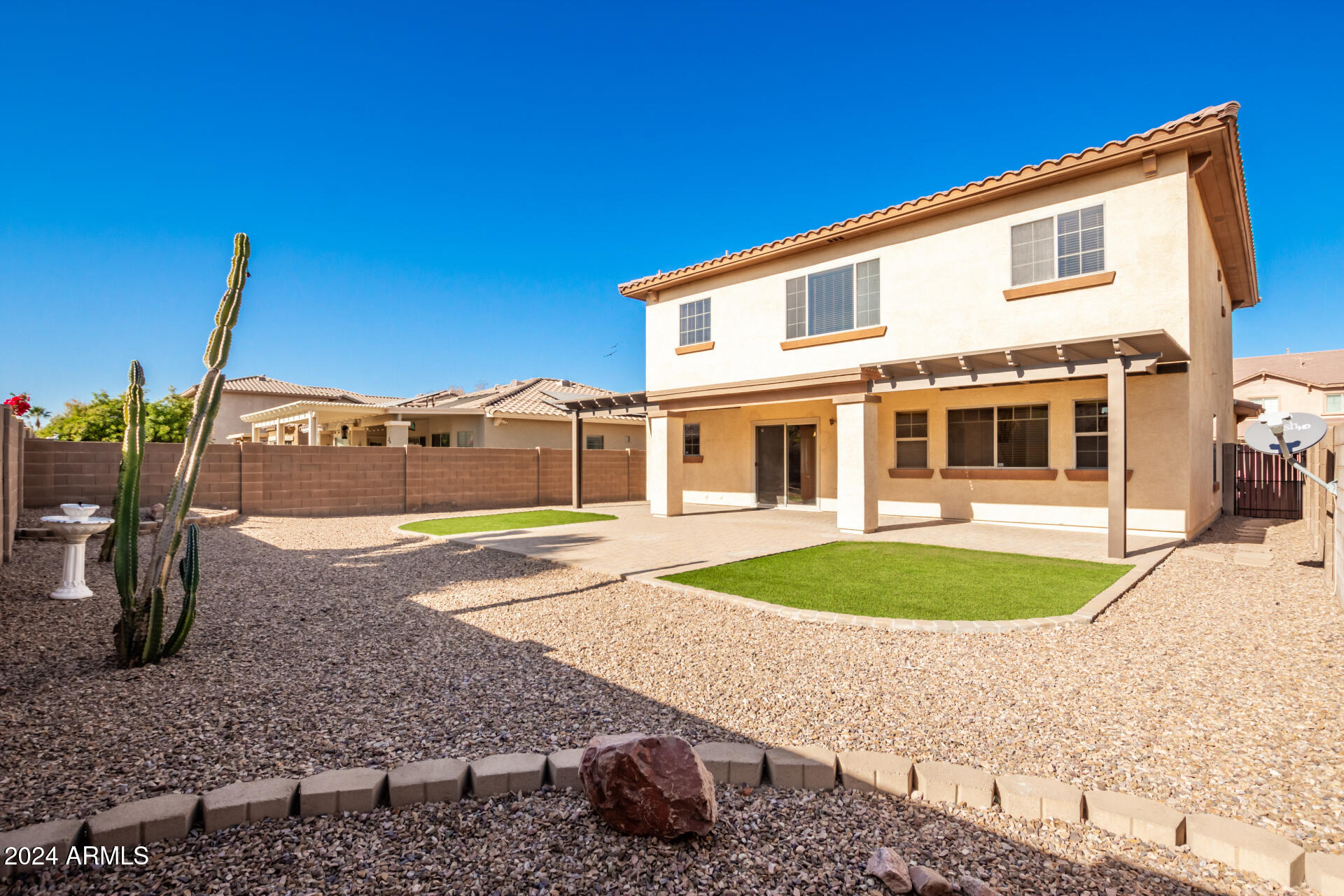 45335 West Rhea Road Maricopa, AZ 85139 - Photo 49 of 52 a view of a house with backyard and swimming pool