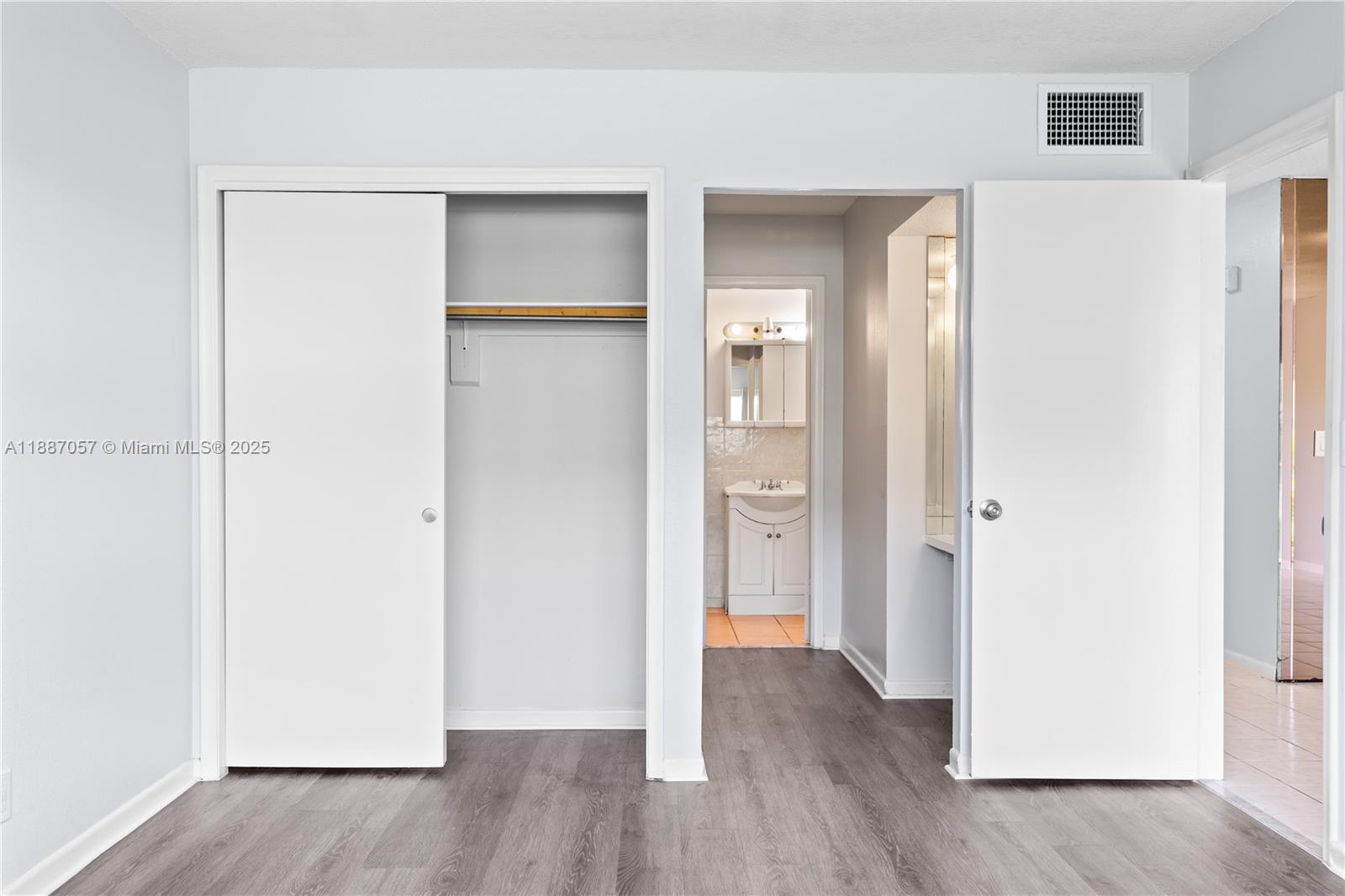 4200 Northwest 3rd Court, Unit 116 Plantation, FL 33317 - Photo 14 of 18 a view of a hallway with wooden floor