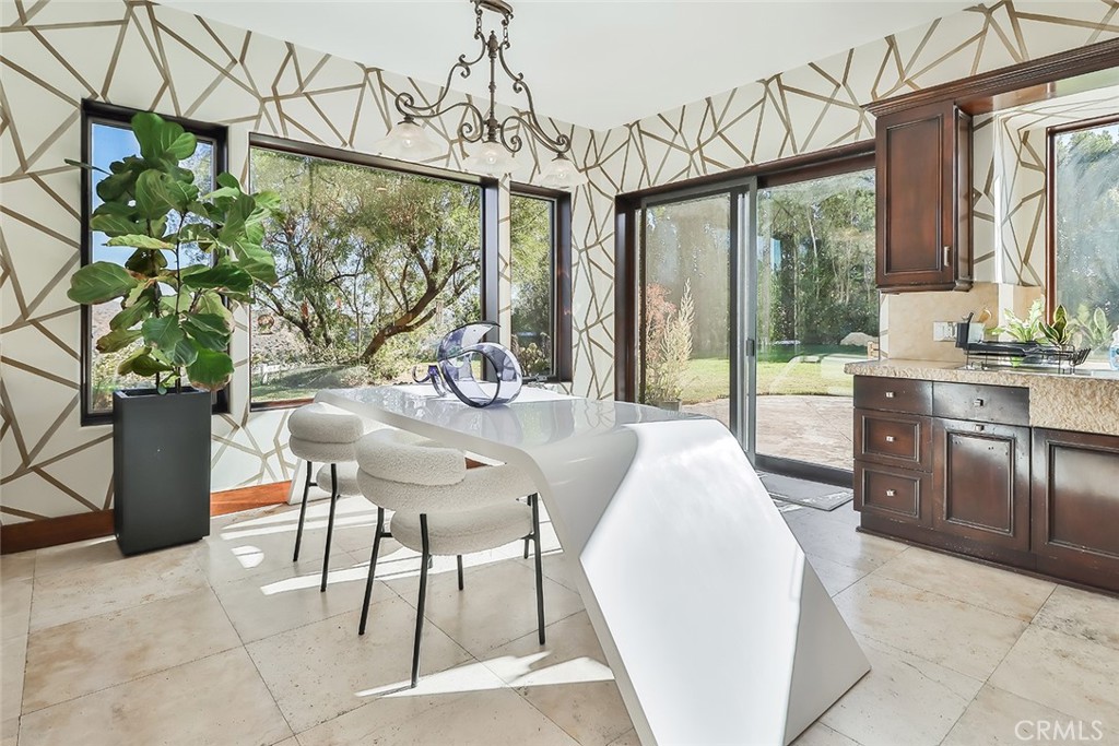 10 Sage Lane Bell Canyon, CA 91307 - Photo 12 of 65 a outdoor dining space with furniture and a potted plant