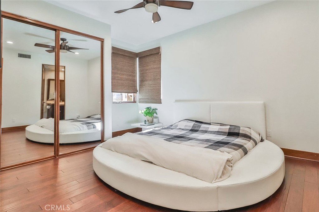 10 Sage Lane Bell Canyon, CA 91307 - Photo 16 of 65 a bedroom with a bed and a table