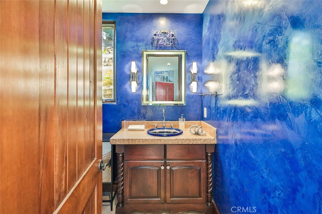 10 Sage Lane Bell Canyon, CA 91307 - Photo 18 of 65 a bathroom with a sink and a mirror