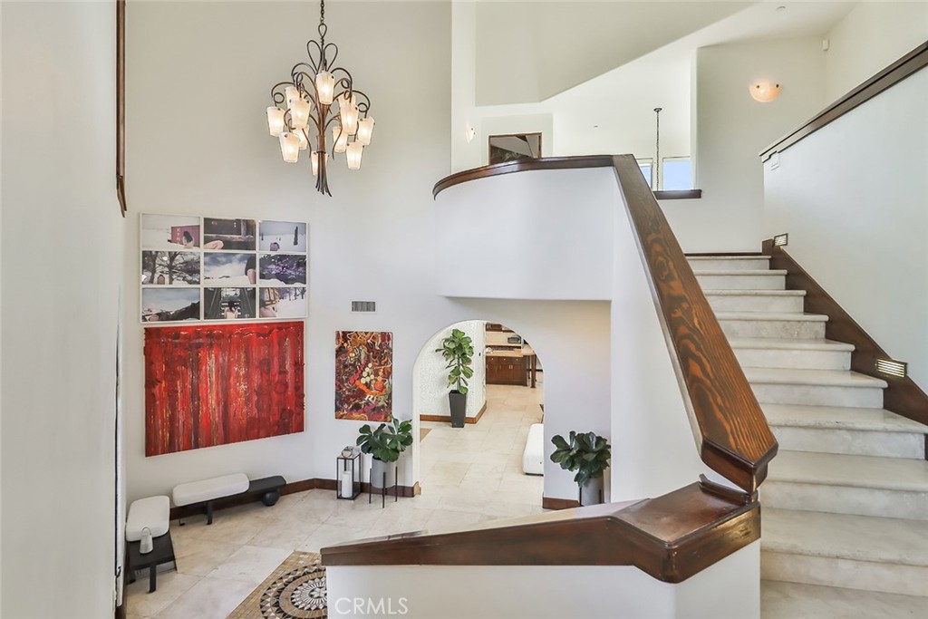 10 Sage Lane Bell Canyon, CA 91307 - Photo 19 of 65 a view of hall way with furniture and wooden floor