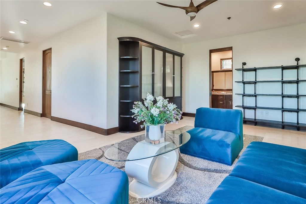 10 Sage Lane Bell Canyon, CA 91307 - Photo 27 of 65 a living room with furniture and potted plant