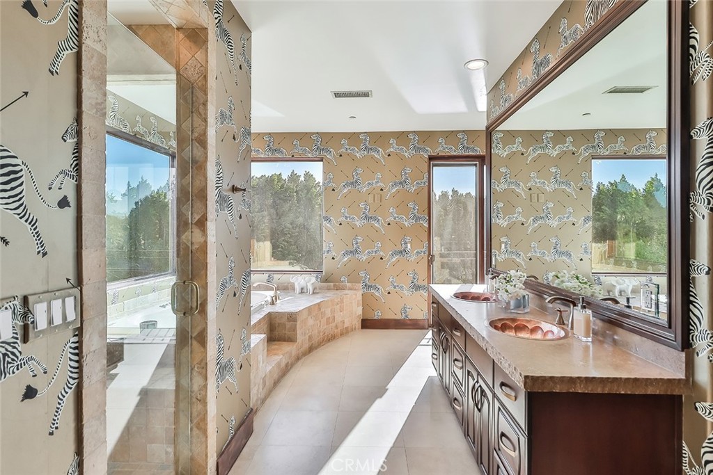 10 Sage Lane Bell Canyon, CA 91307 - Photo 35 of 65 a dining room with a large window and table