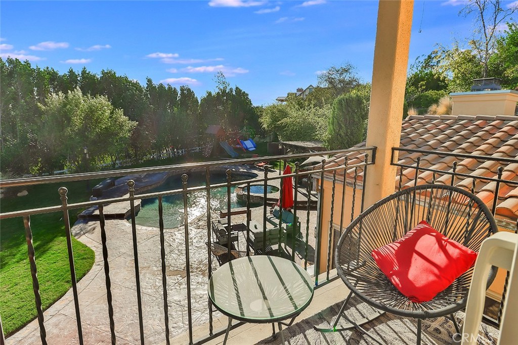 10 Sage Lane Bell Canyon, CA 91307 - Photo 37 of 65 a view of a chairs and table in the balcony