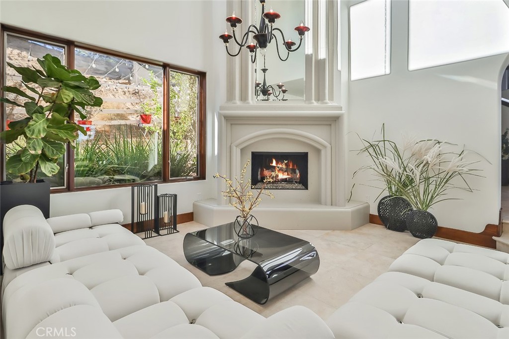 10 Sage Lane Bell Canyon, CA 91307 - Photo 5 of 65 a living room with furniture and a fireplace