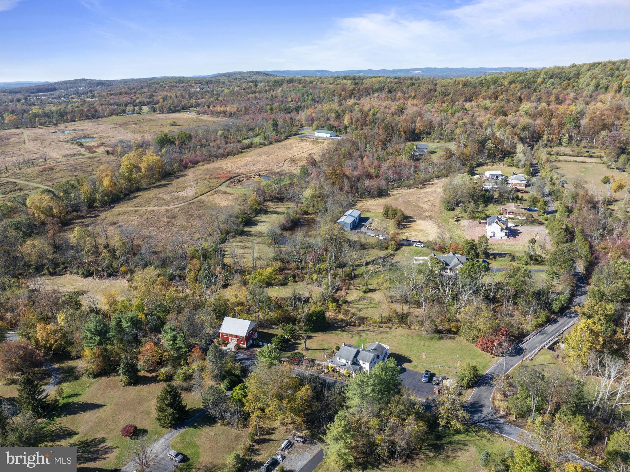 111 Mine Run Road Schwenksville, PA 19473 - Photo 17 of 60 an aerial view of house with yard and mountain in back