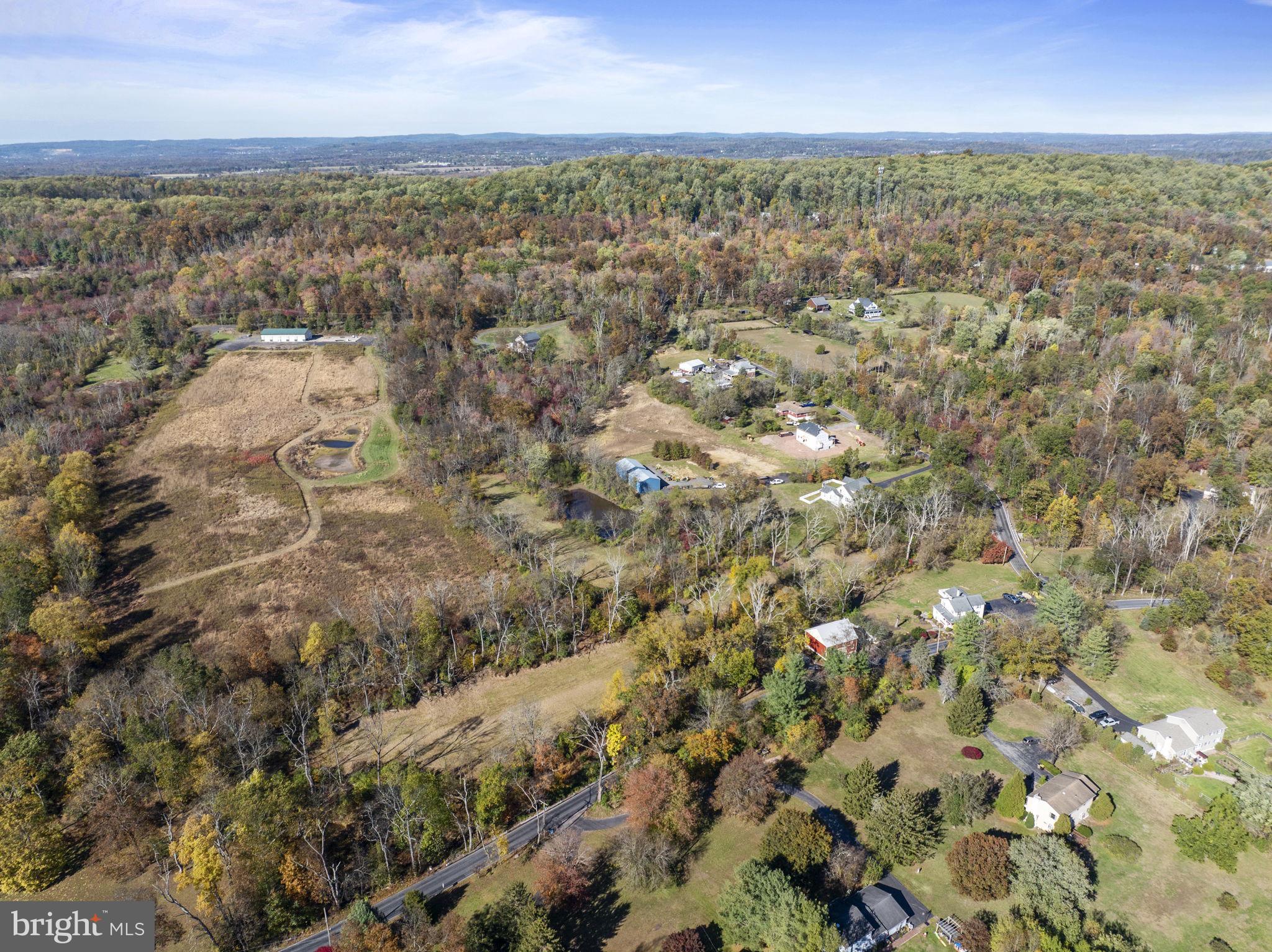111 Mine Run Road Schwenksville, PA 19473 - Photo 20 of 60 an aerial view of residential houses with outdoor space