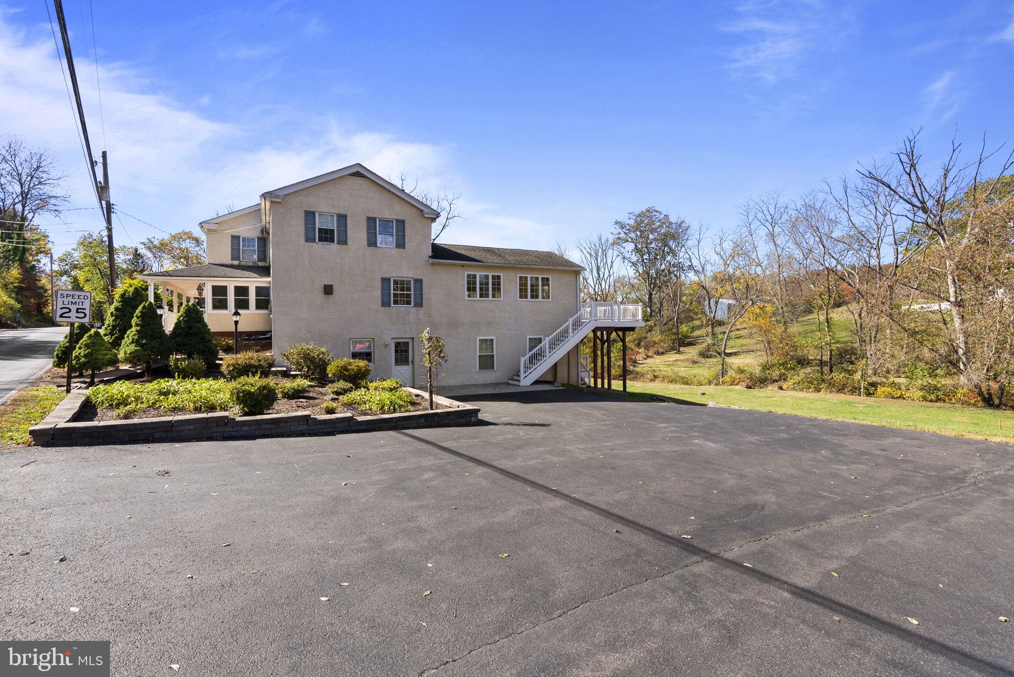 111 Mine Run Road Schwenksville, PA 19473 - Photo 3 of 60 a house view with a garden space