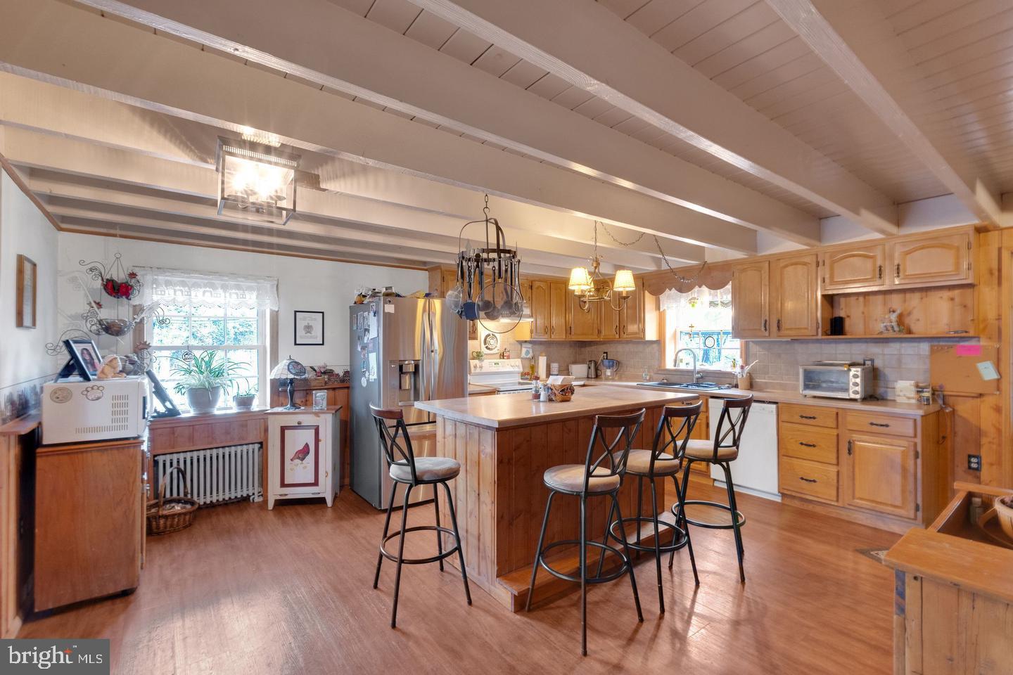 111 Mine Run Road Schwenksville, PA 19473 - Photo 35 of 60 a view of a dining room with furniture and wooden floor