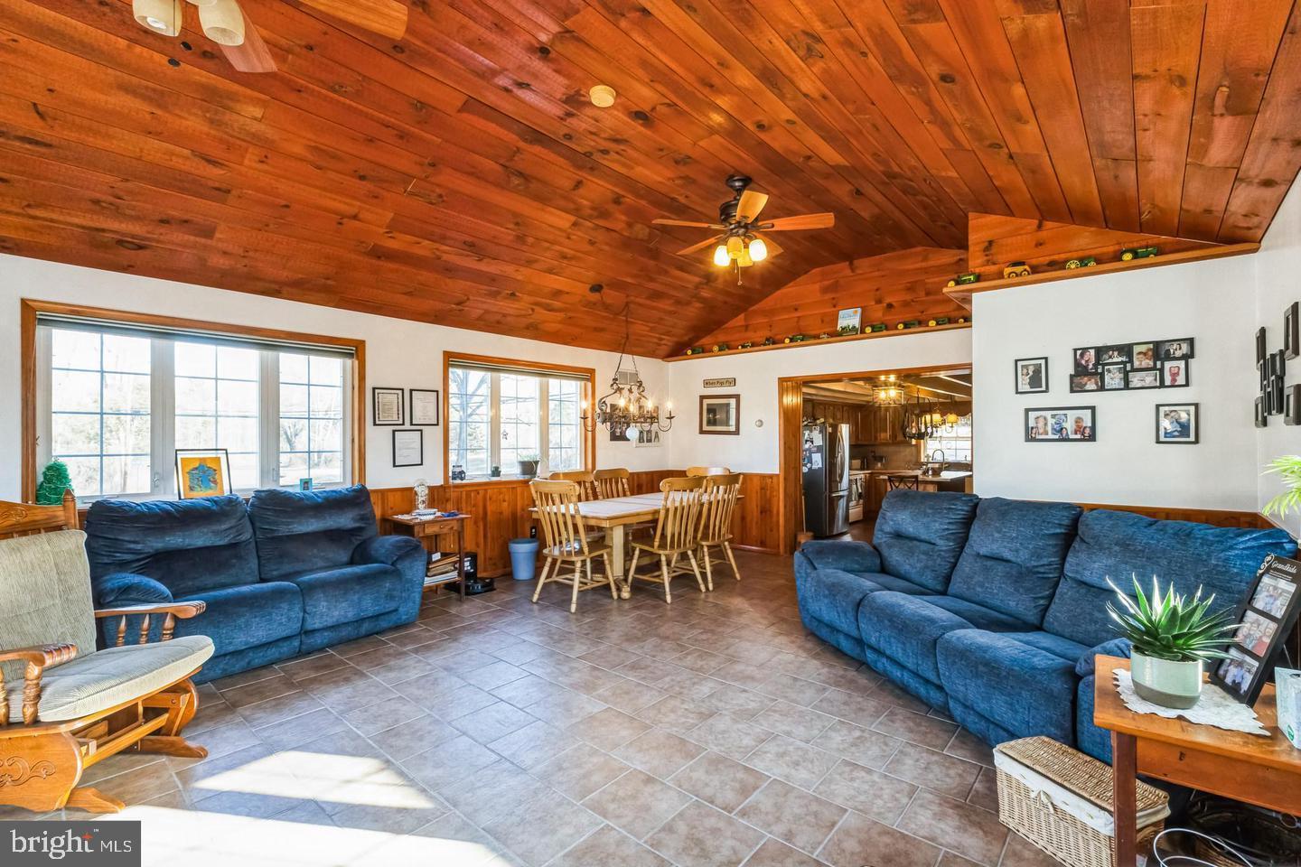 111 Mine Run Road Schwenksville, PA 19473 - Photo 37 of 60 a living room with furniture and a large window