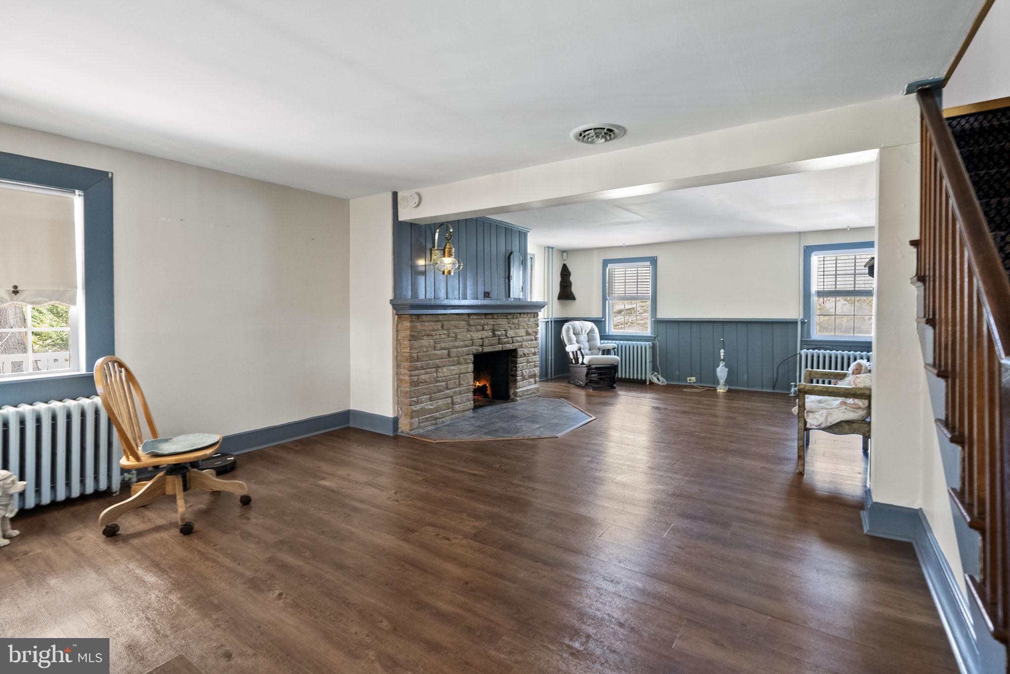 111 Mine Run Road Schwenksville, PA 19473 - Photo 40 of 60 a view of a livingroom with furniture and a fireplace