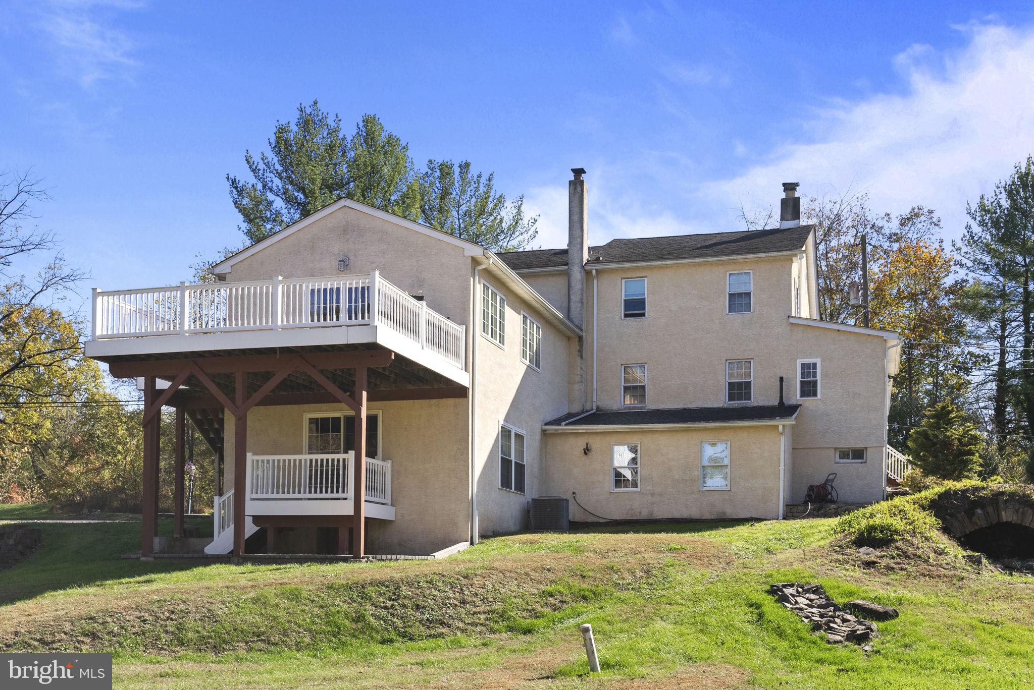 111 Mine Run Road Schwenksville, PA 19473 - Photo 4 of 60 a front view of a house with garden