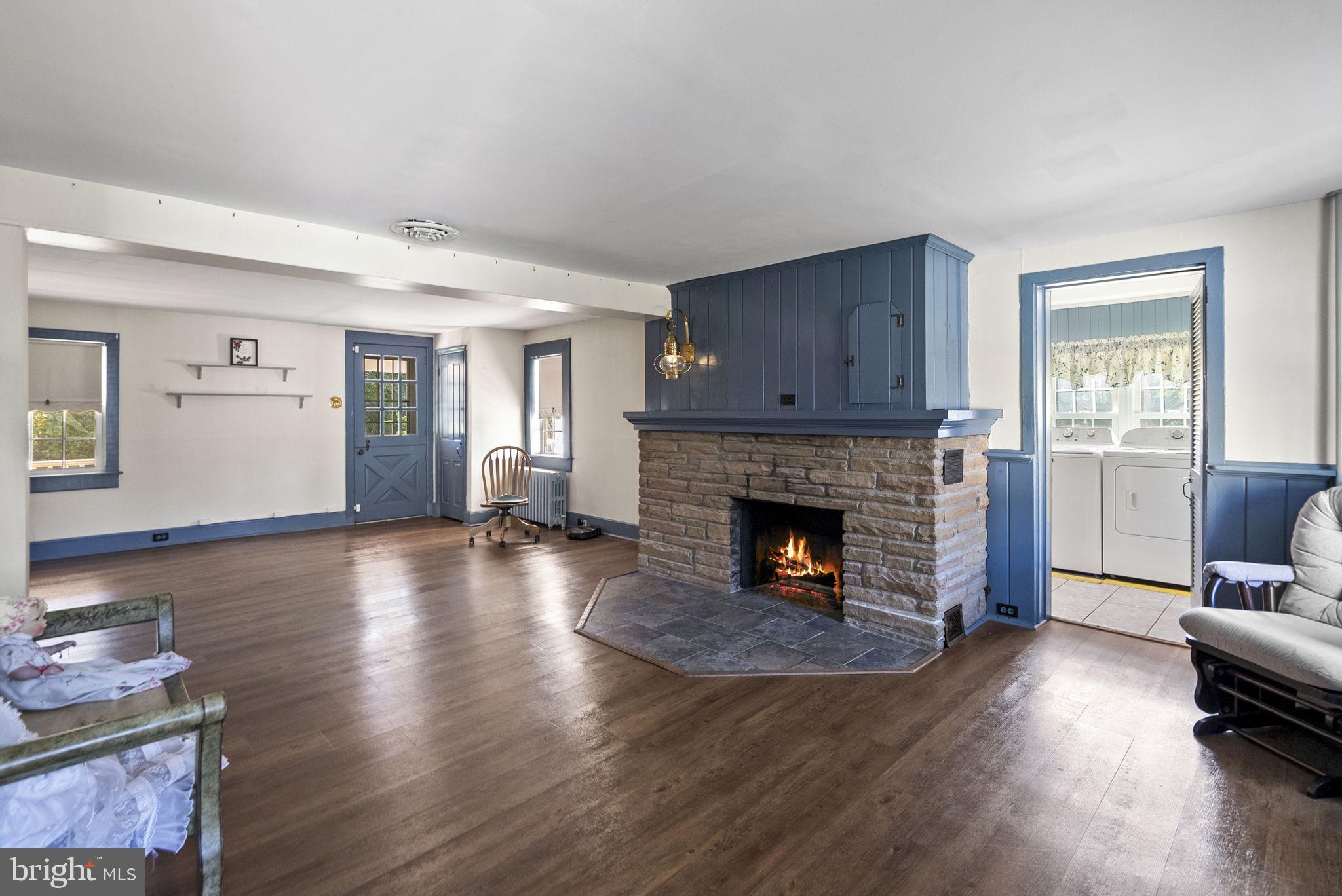 111 Mine Run Road Schwenksville, PA 19473 - Photo 42 of 60 a living room with furniture and a fireplace
