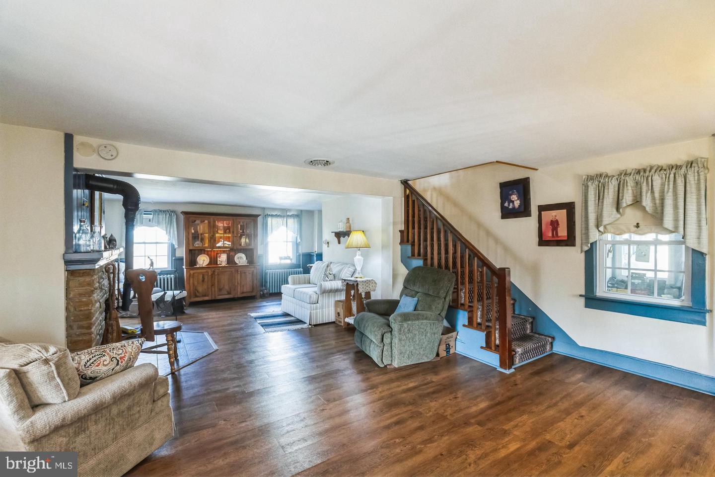 111 Mine Run Road Schwenksville, PA 19473 - Photo 43 of 60 a living room with furniture and wooden floor