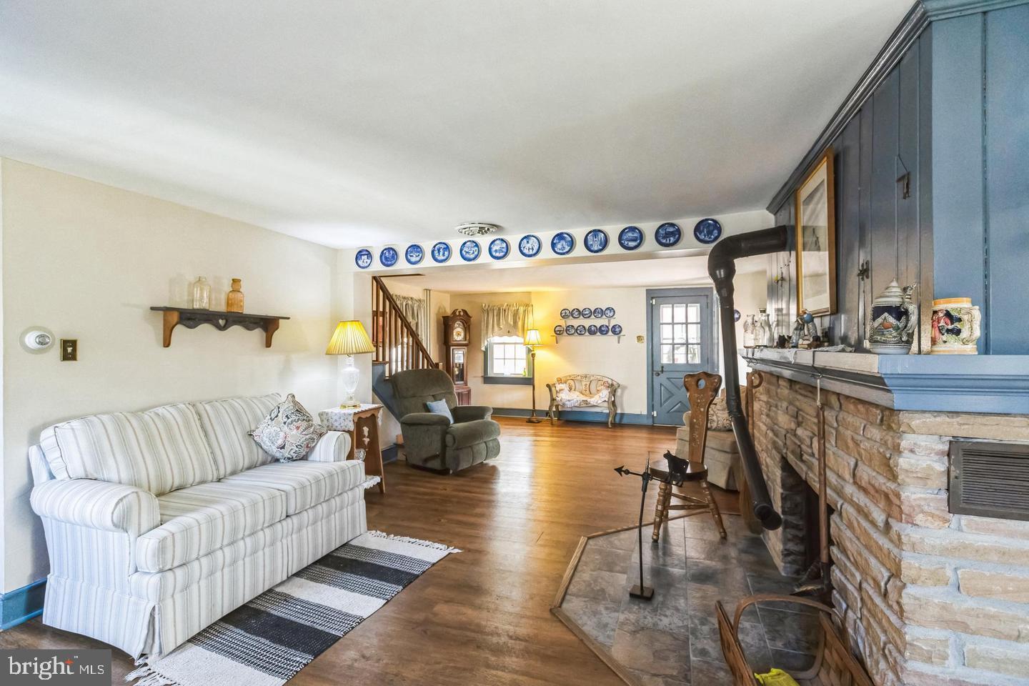 111 Mine Run Road Schwenksville, PA 19473 - Photo 44 of 60 a living room with furniture and a wooden floor