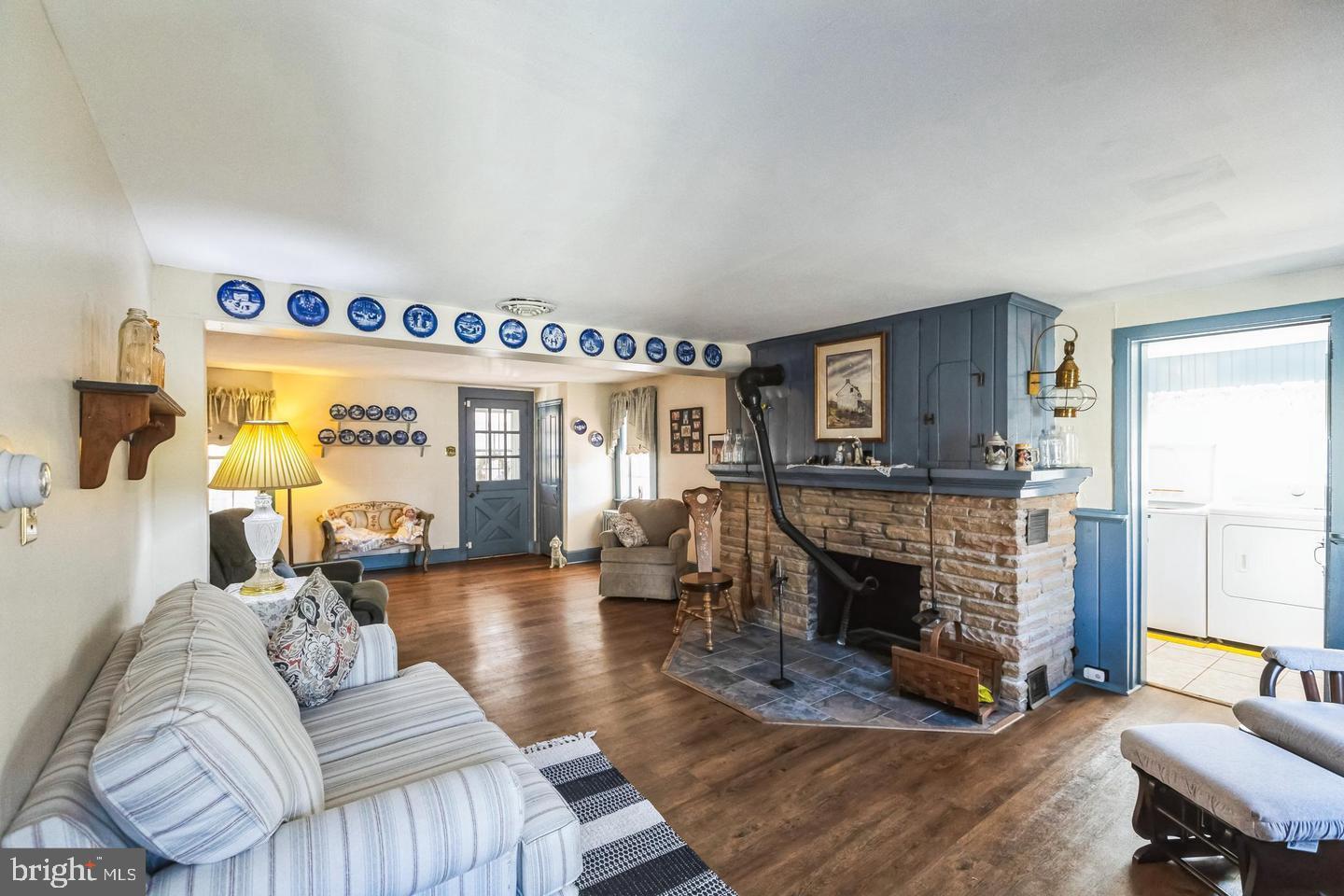 111 Mine Run Road Schwenksville, PA 19473 - Photo 45 of 60 a living room with furniture and a fireplace