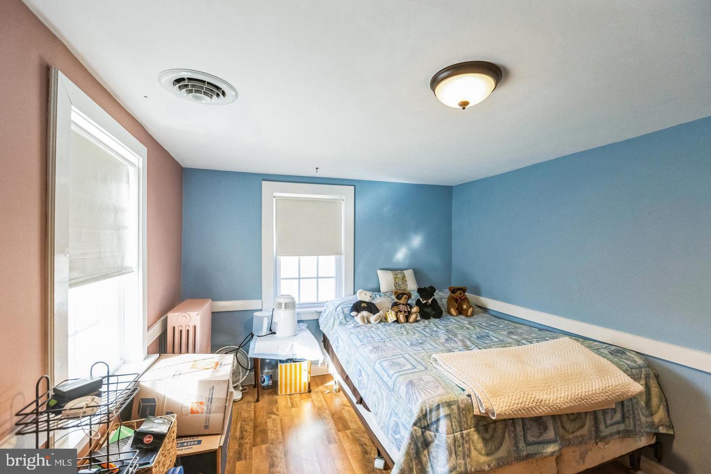 111 Mine Run Road Schwenksville, PA 19473 - Photo 50 of 60 a bed sitting in a bedroom next to a window