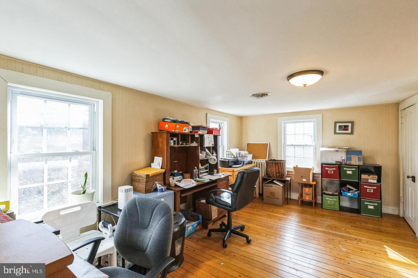 111 Mine Run Road Schwenksville, PA 19473 - Photo 52 of 60 a view of a workspace with furniture and a window