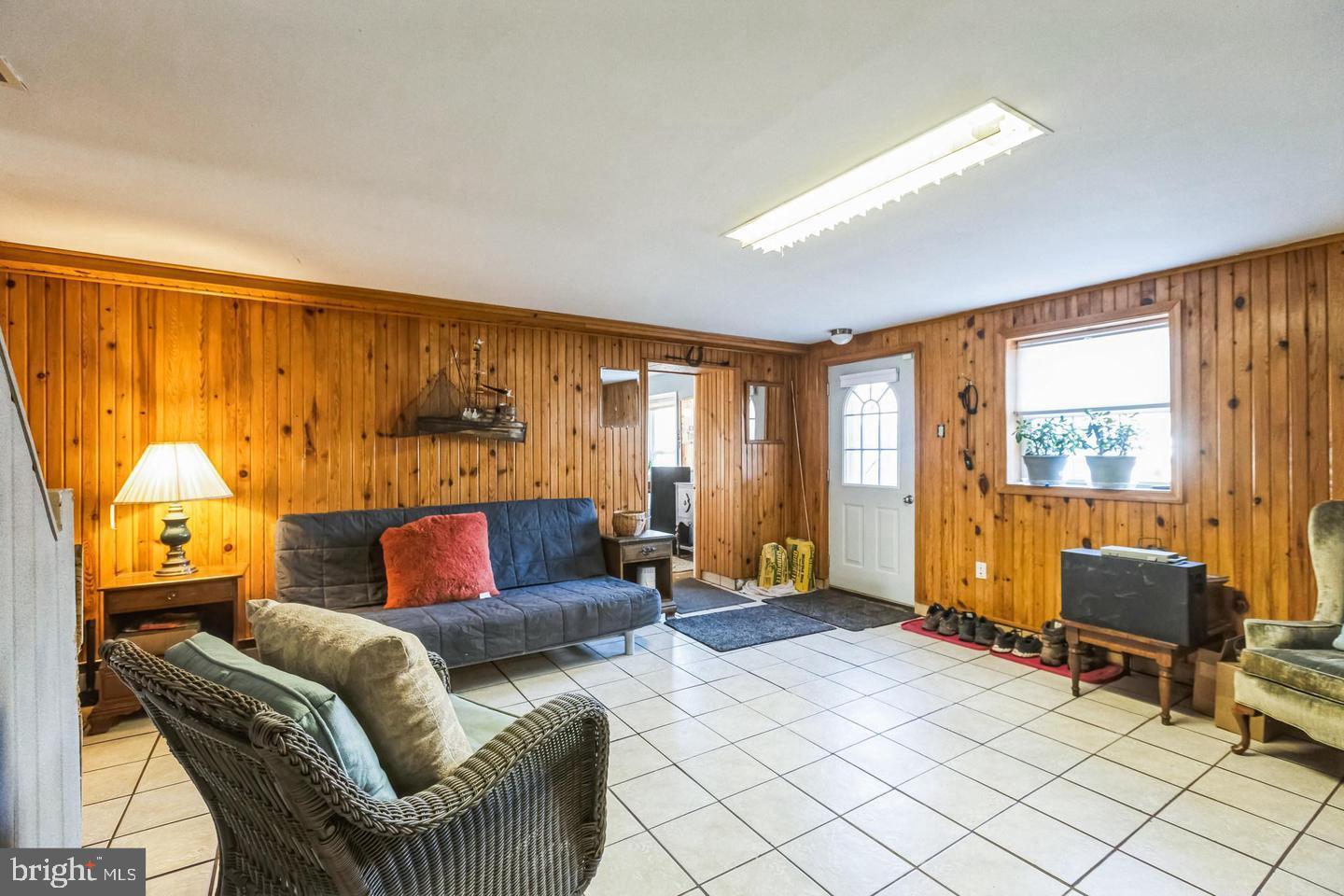 111 Mine Run Road Schwenksville, PA 19473 - Photo 55 of 60 a living room with furniture and a large window