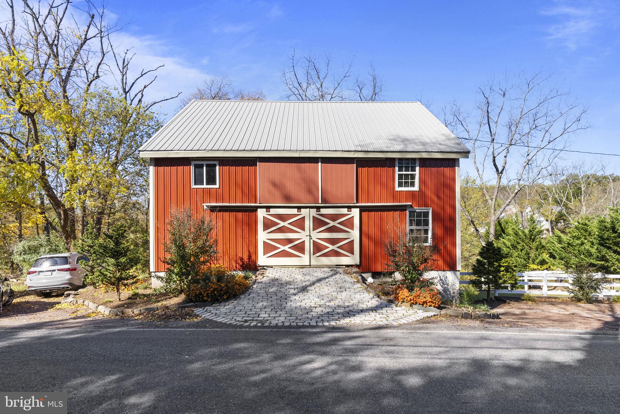111 Mine Run Road Schwenksville, PA 19473 - Photo 7 of 60 a front view of a house with a yard