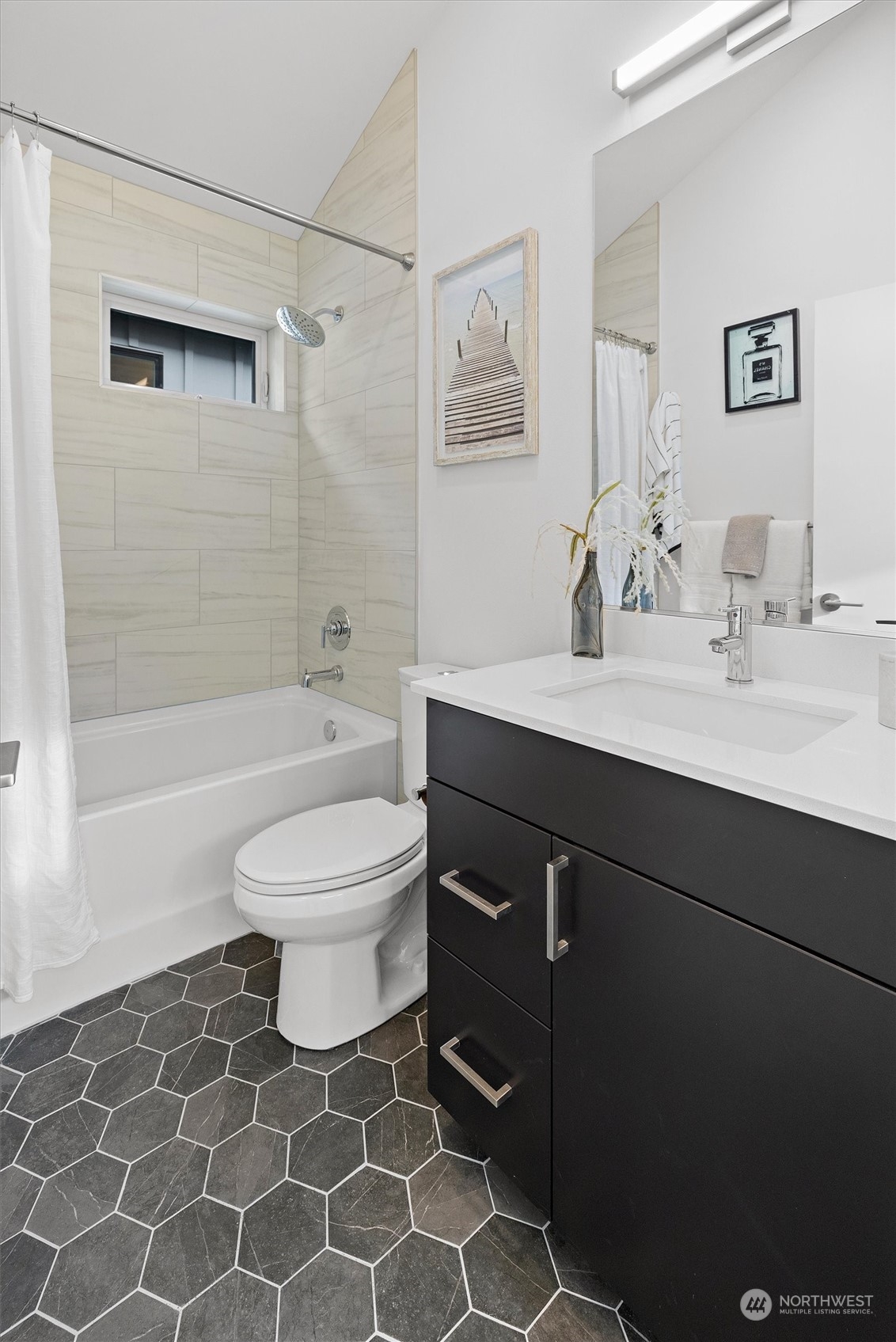 2119 South Walker Street, Unit B Seattle, WA 98144 - Photo 21 of 23 a bathroom with a sink a toilet and shower