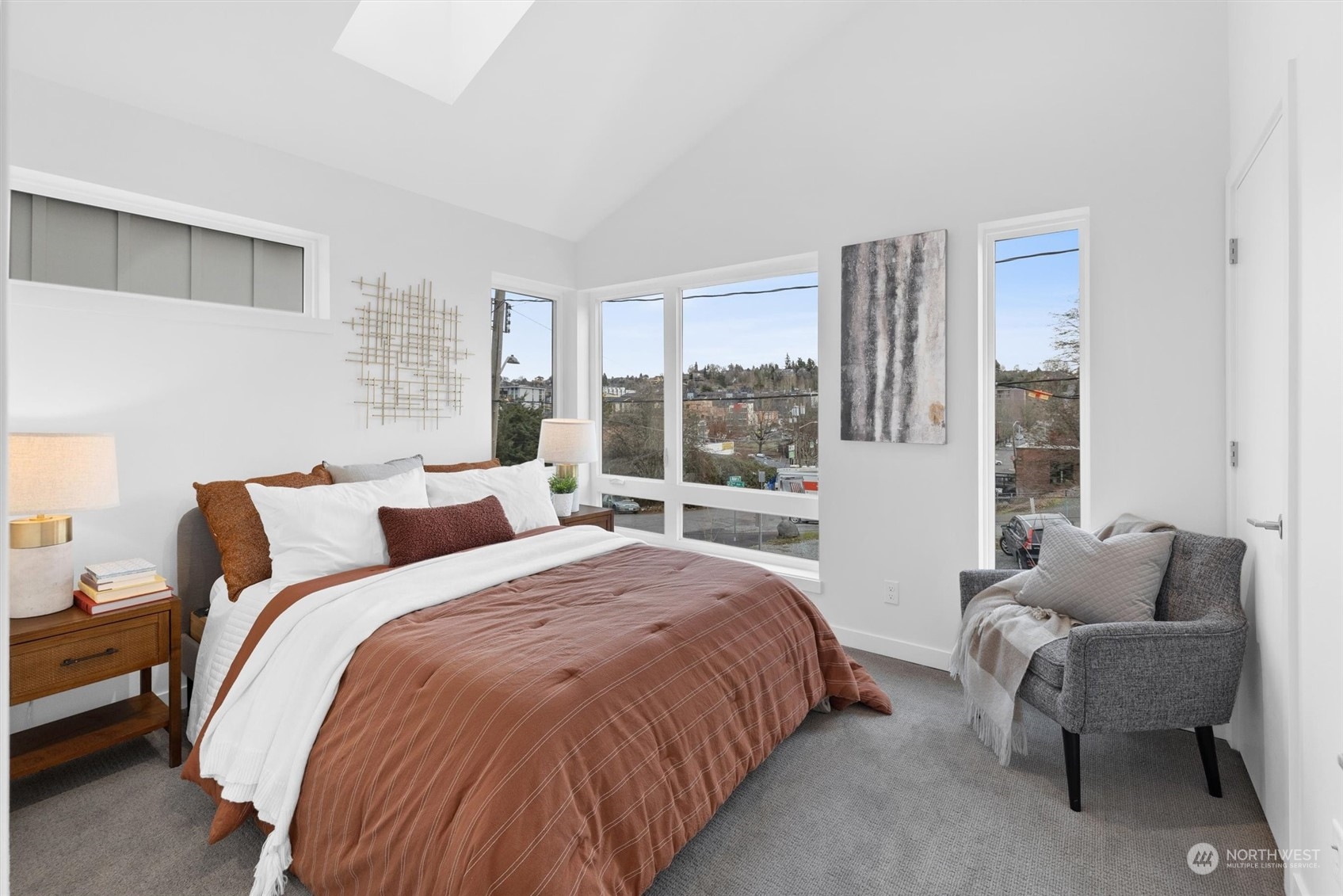2119 South Walker Street, Unit B Seattle, WA 98144 - Photo 22 of 23 a bedroom with bed and a large window